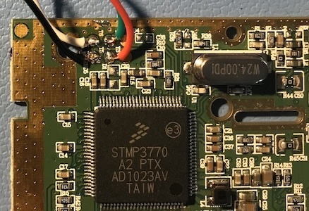 PCB with jumper wires connected to test points